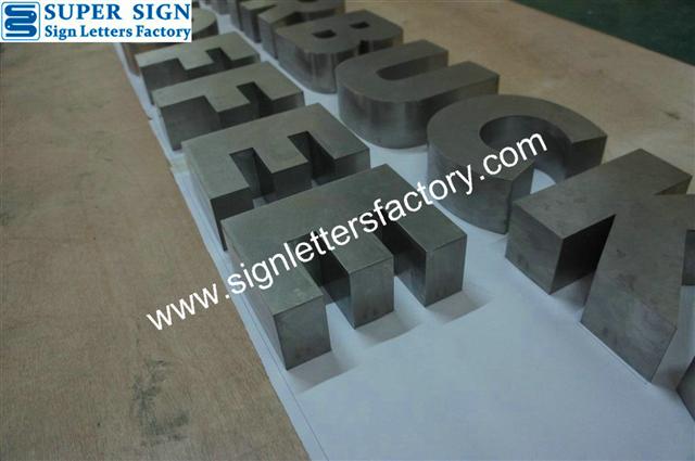 Fabricated stainless steel lettering